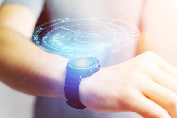 Concepto de una rueda tecnológica futurista que sale de un reloj inteligente — Foto de Stock