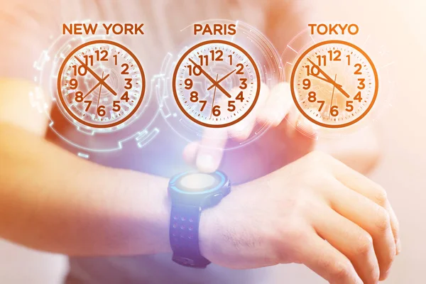 Concept de décalage horaire avec différentes heures sur une smartwatch — Photo