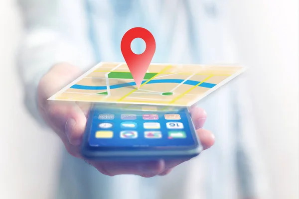 Pojmu geografická lokalizace na mapě s chytrým telefonem — Stock fotografie