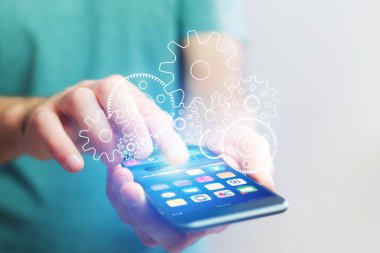 Bir akıllı telefon dışarı gidiyor dişli ayar kavramı