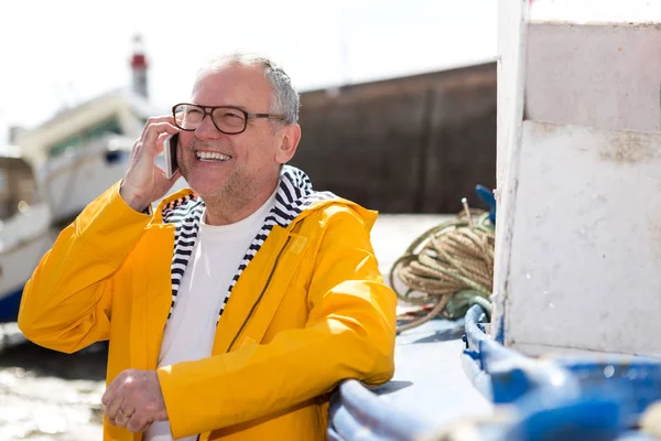 Smiling senior fisherman — Stock Photo, Image