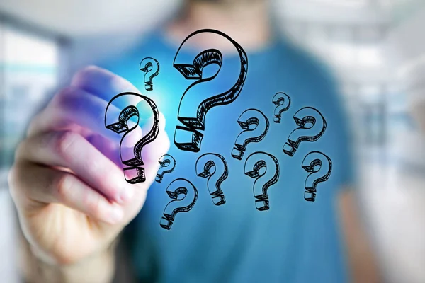 Man drawing question mark icons — Stock Photo, Image