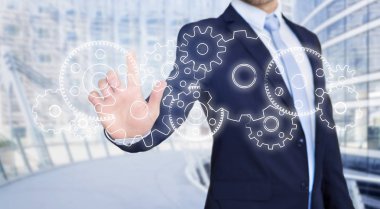 Grafik arayüzü tutan işadamı