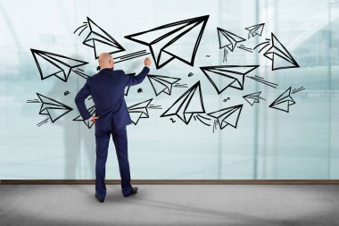 İşadamı çizim kağıt uçaklar 