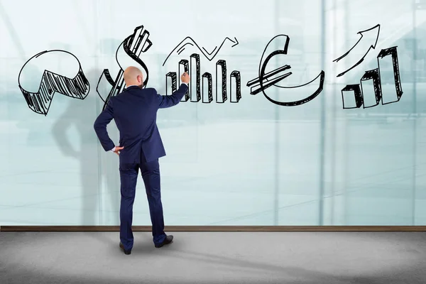 Businessman in front of wall — Stock Photo, Image