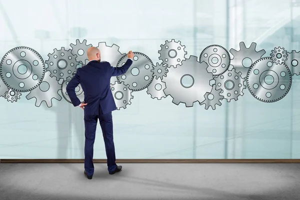 İşadamı dijital duvar önünde