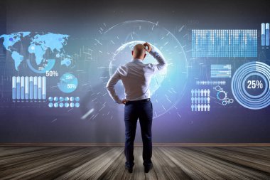 işadamı bir duvarın önünde 