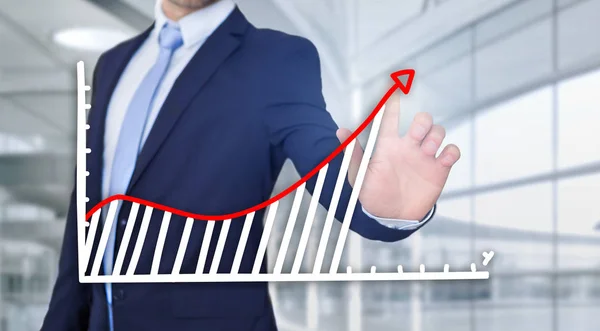 Zakenman raakt interface met financiële curve en grafiek — Stockfoto