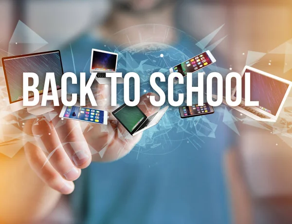 Volver al título escolar rodeado de dispositivos —  Fotos de Stock