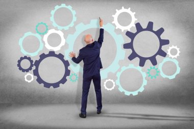 İşadamı ve Dişli tekerlekleri duvar