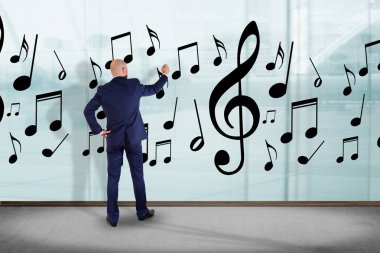 İşadamı ve müzik notları 