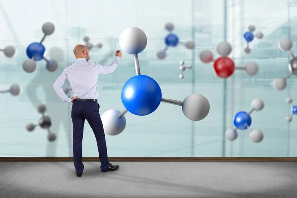 Businessman and molecular models — Stock Photo, Image