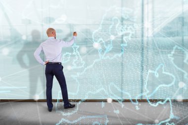 duvarda işadamı ve Dünya Haritası