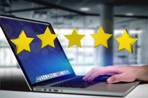laptop with Five yellow stars