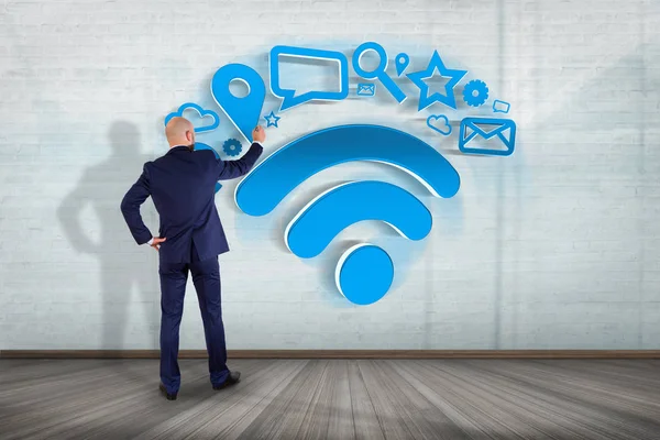 Uomo d'affari con connessione wifi simbolo — Foto Stock