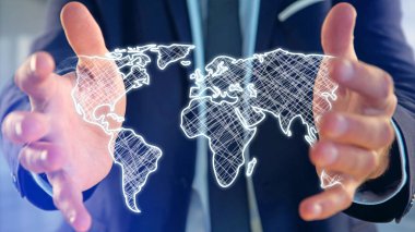 Bir elini tutarak bir işadamı görünümünü dünya haritası üzerinde futuristik bir arayüze çizilmiş.