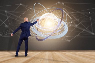 Futuristik bir arayüze işadamı önünde bir duvar ile bağlı dünya kavramı simge görünümü 