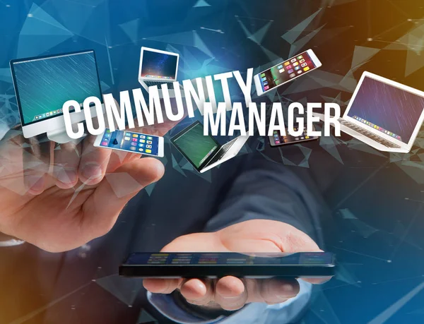 View of a Community manager title surounded by device like smartphone, tablet or laptop - Internet and communication concept