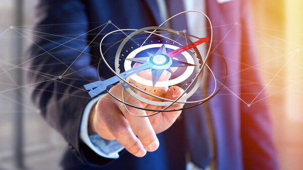 Вид предпринимателя, держащего навигационный компас - 3D рендеринг
