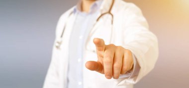 Doktor işaret parmağı görünümü arka plan bulanık '