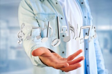 Erkek el altında müzik notlar fütüristik arabirimde kapat