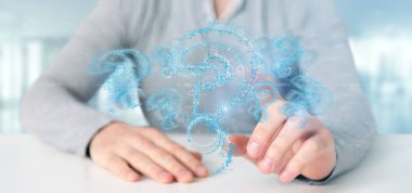 Soru işareti ışık arka plan üzerinde tutan işadamı