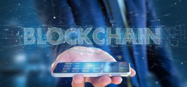 Bir Blockchain başlık tutan işadamı 