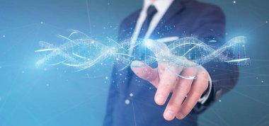 Bir 3d tutan bir işadamı görünümünü işlemek Dna