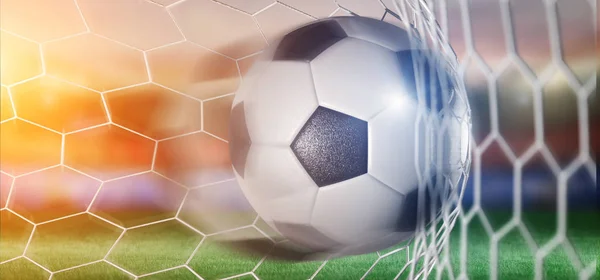 View of a Football ball in the net of a goal - 3d rendering