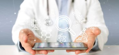 Doktor, kliniğe steteskop kullanarak işaret etti.