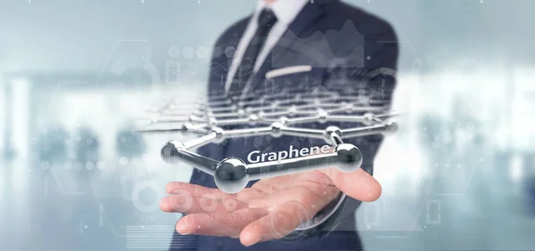 Businessman holding a graphene structure - 3d rendering — Stock Photo, Image