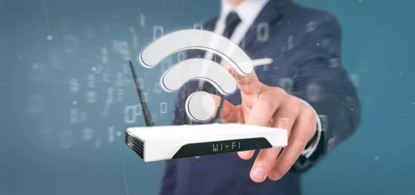 Üzletember kezében egy Wifi router és adatok - 3d renderelés Stock Kép