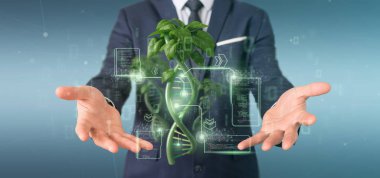 Businessman holding a DNA growing as a plant - 3d rendering