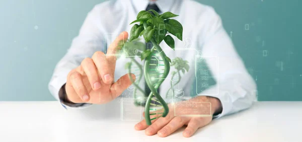 Businessman holding a DNA growing as a plant - 3d rendering — Stok fotoğraf