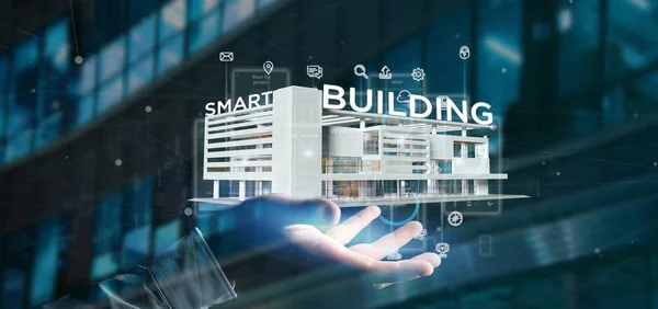 Empresario sosteniendo un edificio inteligente conectado - 3d renderizado Fotos de stock libres de derechos