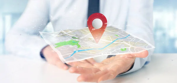 Podnikatel, drží 3d vykreslování držák čepů na mapě — Stock fotografie