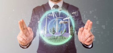 Rüzgâr türbinleri ve güneş paneli ile temiz enerji üreten bir iş adamının görüntüsü - 3D görüntüleme