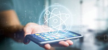 Veri ile çevrili bir atom simgesi tutan bir Işadamı görünümü