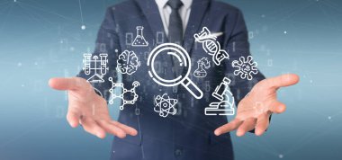 Bilim bulut simgesi tutan bir Işadamı görünümü