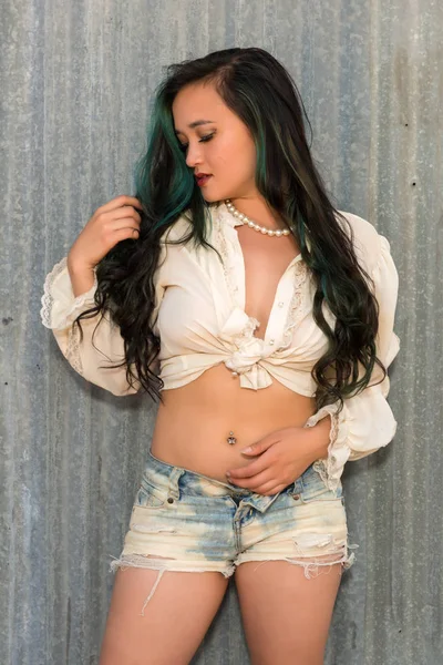 Leanne crow bursting shirt Stock Photos, Royalty Free Leanne crow