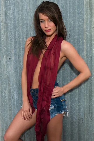 Brunette in a scarf and cutoffs — Stock Photo, Image