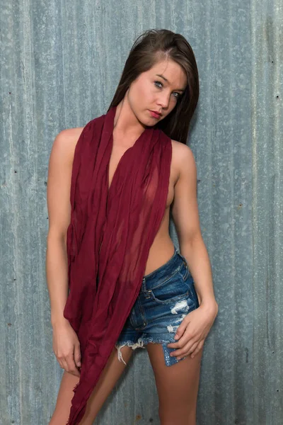 Brunette in a scarf and cutoffs — Stock Photo, Image