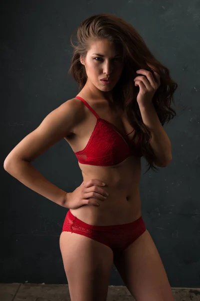 Brunette in red — Stock Photo, Image
