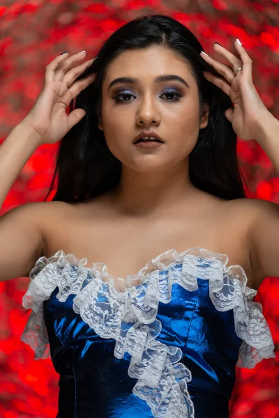 Brunette in blue and white — Stock Photo, Image