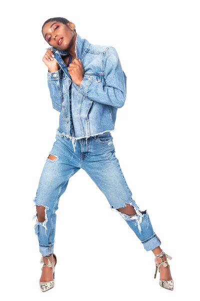Sort hår og blå jeans - Stock-foto