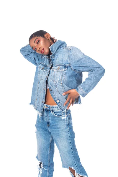 Sort hår og blå jeans - Stock-foto