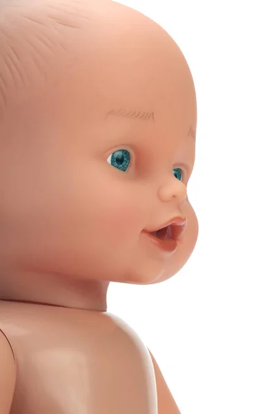 Brinquedo de boneca bebê no fundo branco . — Fotografia de Stock
