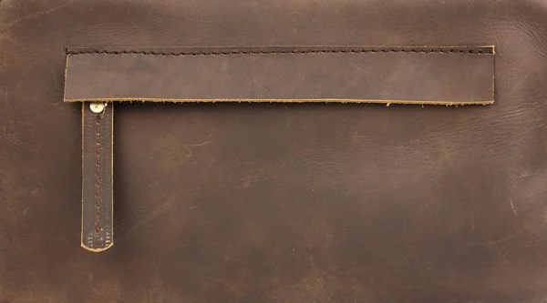 隐藏的拉链口袋，自然棕色皮革 图库照片