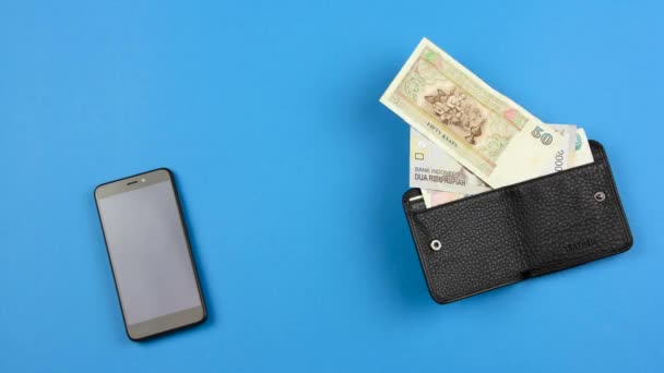 Cash Currency Transferred Smartphone Black Leather Wallet Concept Wireless Finance — Stock Video