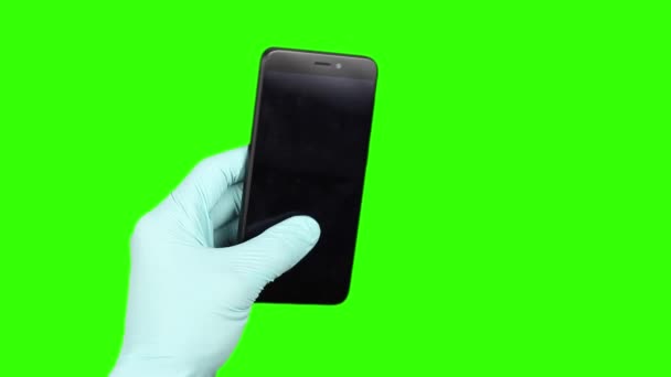 Menschliche Hände Blauen Medizinischen Handschuhen Wischen Vor Schwarzem Telefon Oder — Stockvideo